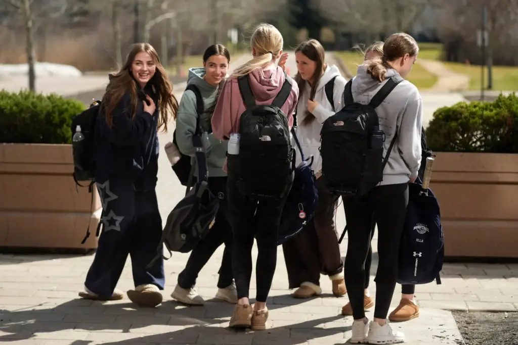Students enjoy a light moment outside Hanover High School,