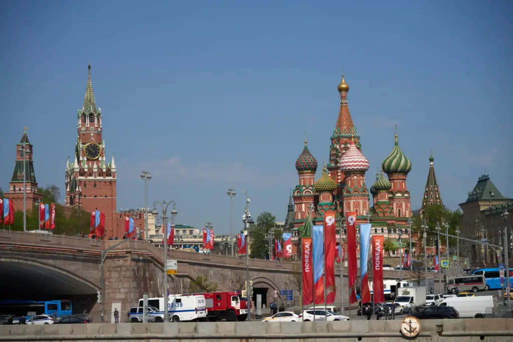 Special service vehicles are parked near Red Square decorated for...