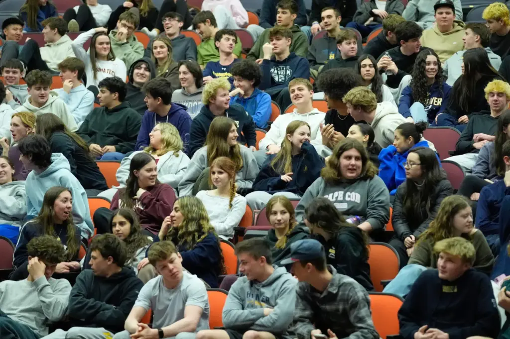 Students discuss ways to prevent school shootings during a presentation