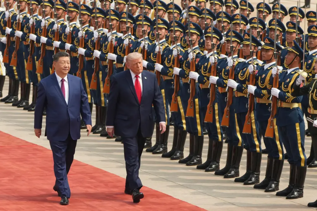President Donald Trump participates in a welcome ceremony with China's President Xi Jinping.