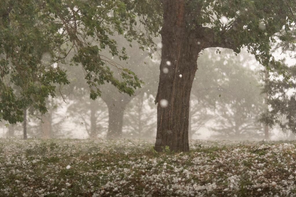 A hailstorm is visible