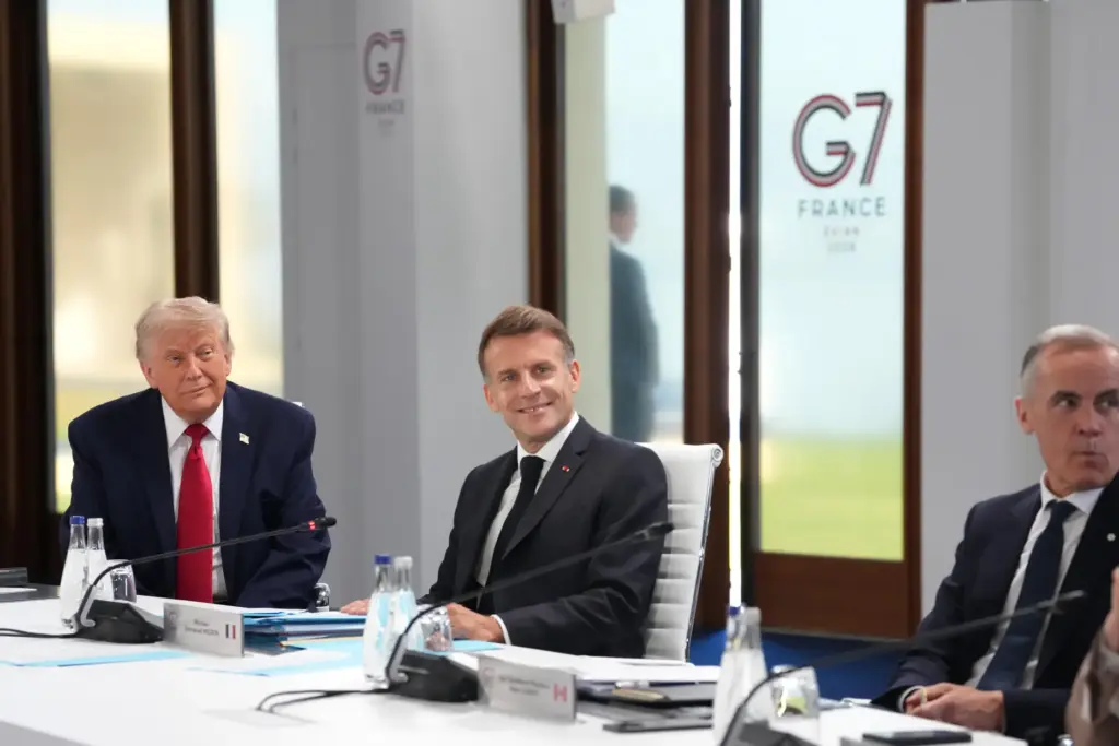 President Donald Trump, French President Emmanuel Macron and Canadian Prime Minister Mark Carney.