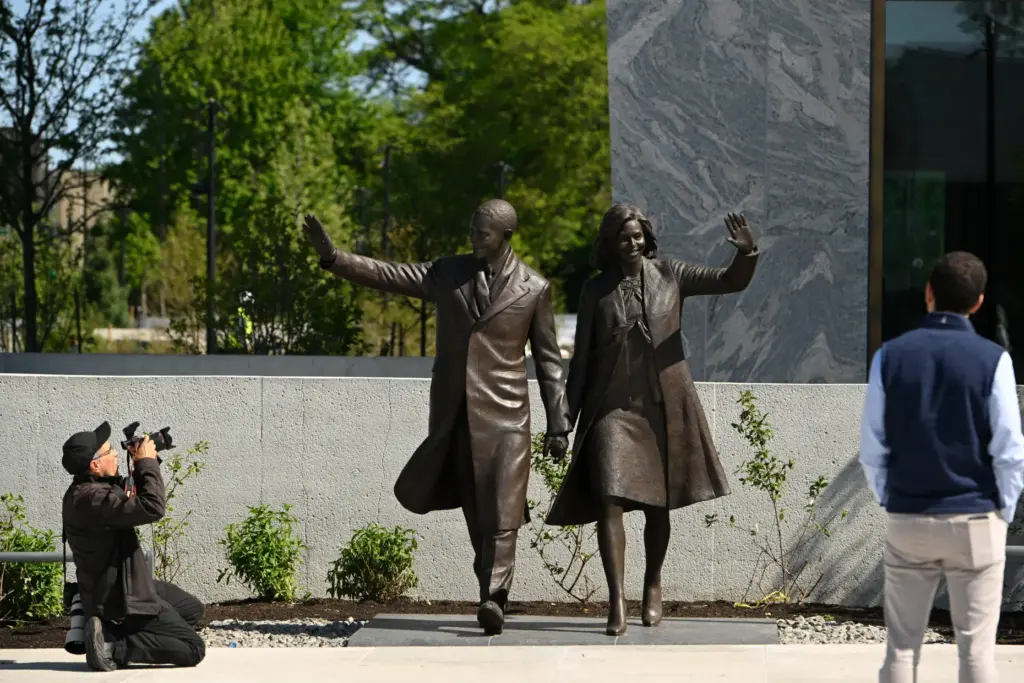 Statues of former President Barack Obama and former first lady Michelle Obama.