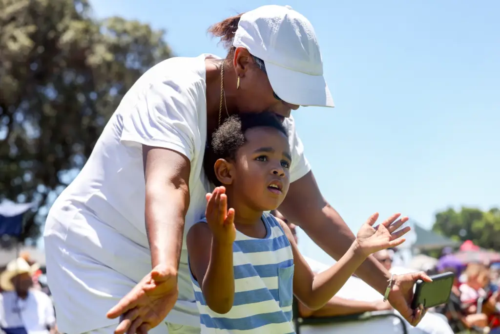 Judah Carter, 5, and Adrienne Jackson, a friend of his...