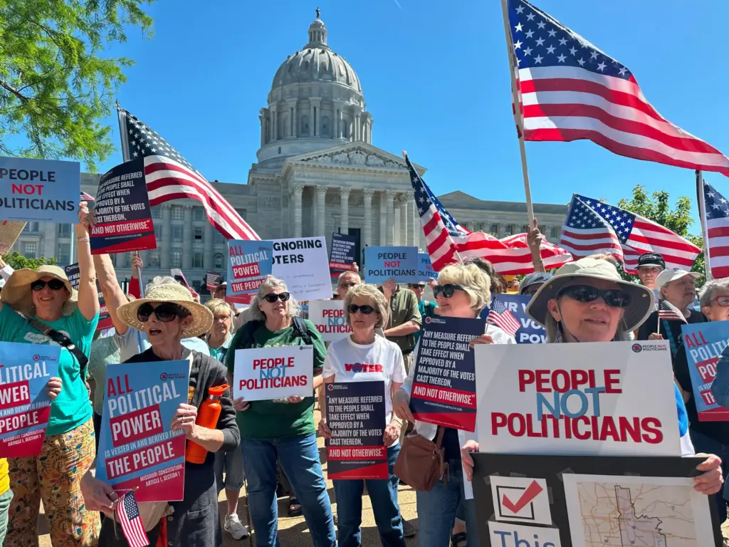 Protesters against a Missouri congressional redistricting plan gather outside the...