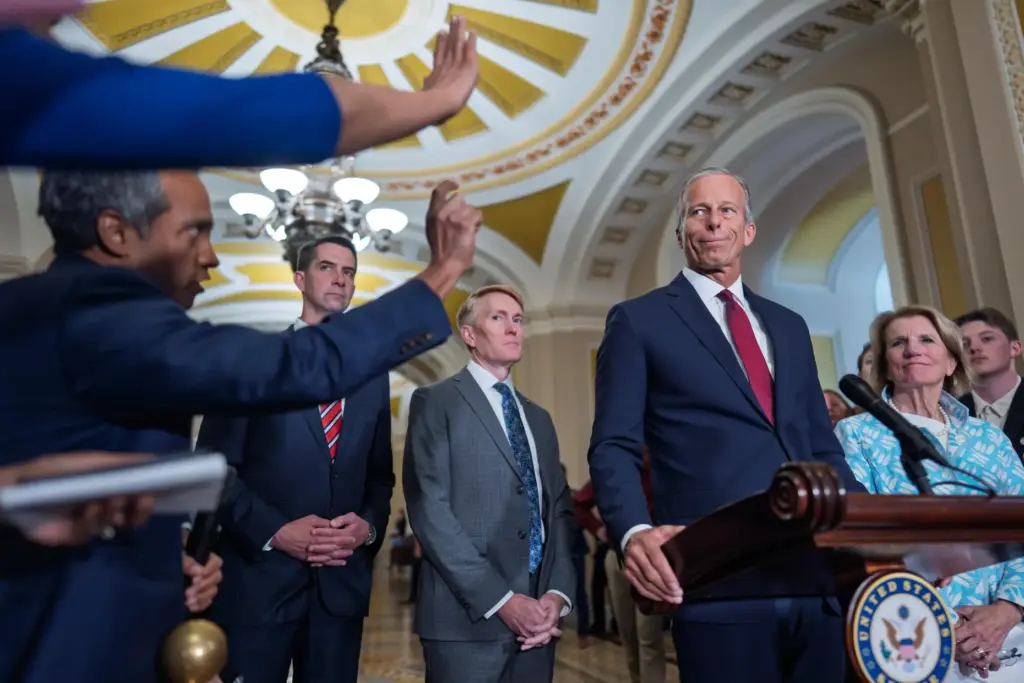 Senate Majority Leader John Thune, R-S.D., joined from left by...