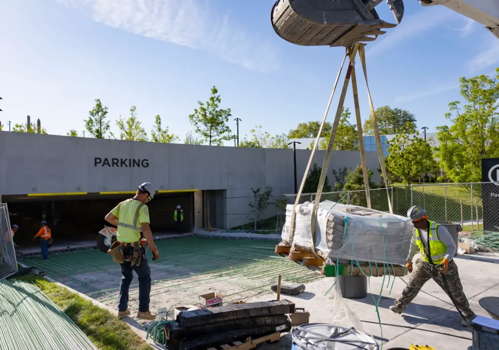 Workers finish the parking garage entrance as the Obama Presidential...