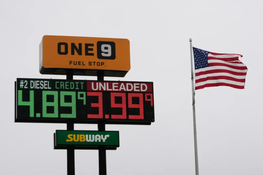 The American Flag flies next to a One9 Fuel Stop...