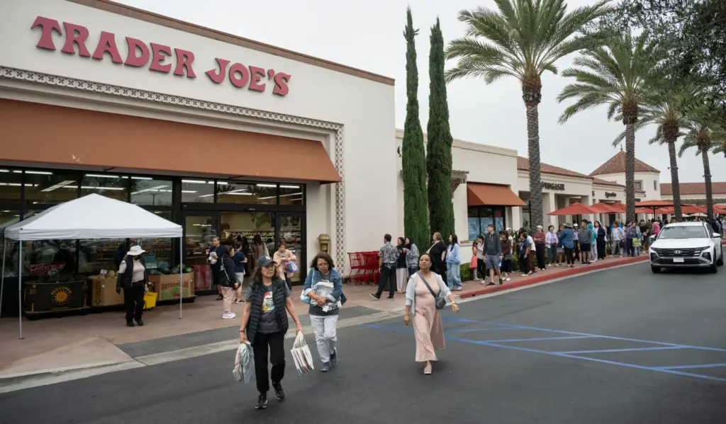 Customers leave Trader Joe’s on Culver Drive in Irvine with...