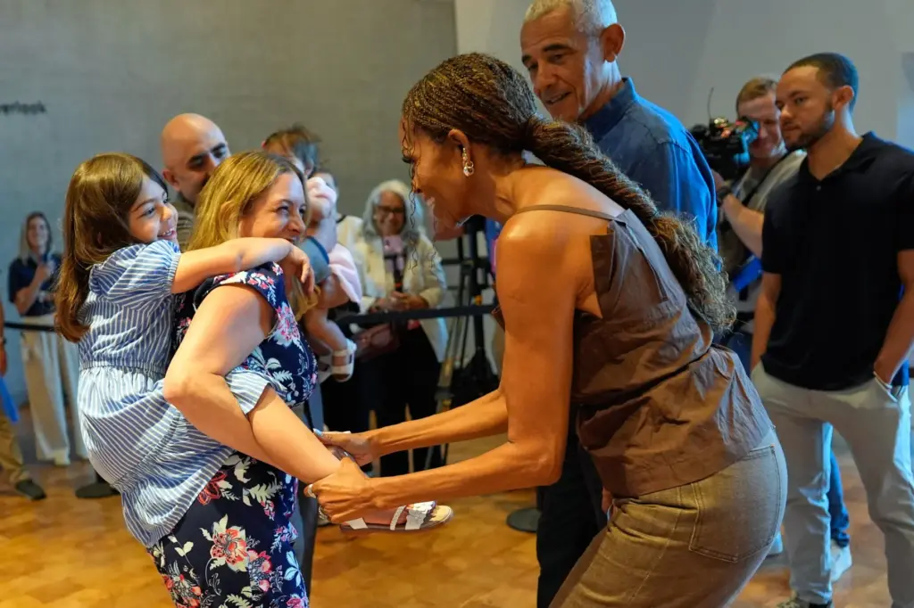 Former President Barack Obama and former first lady Michelle Obama...