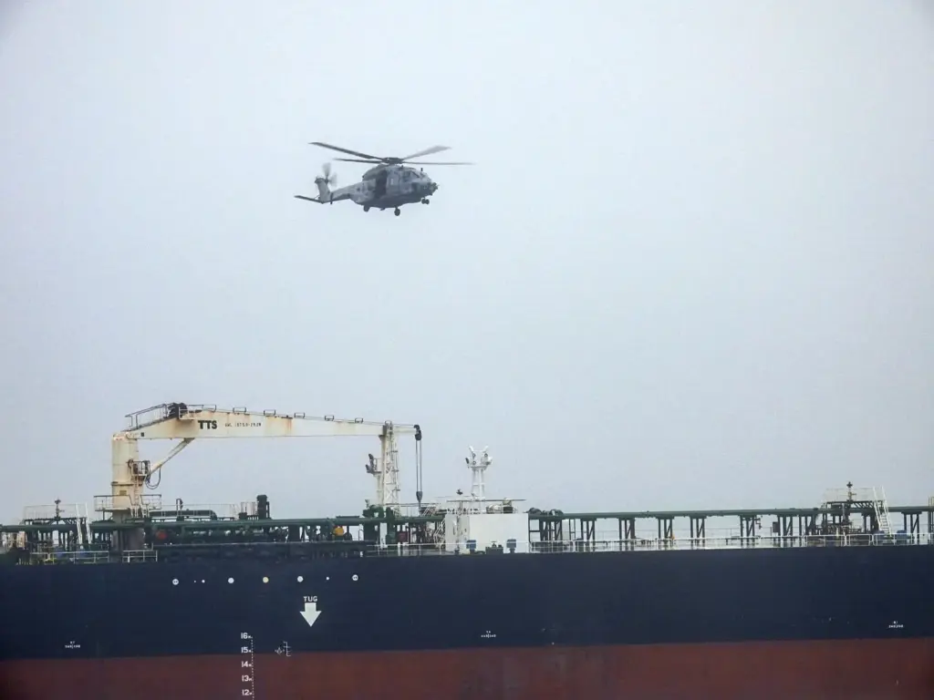 An NH90 helicopter intercepts an oil tanker that was traveling from Russia.