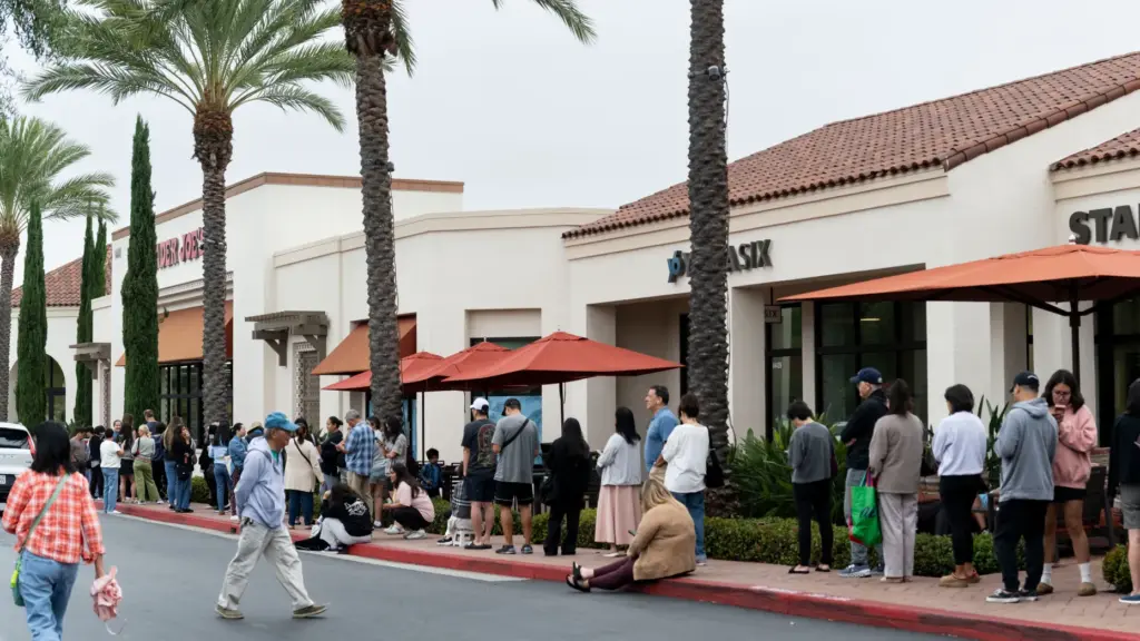 Customers line up to purchase the new Trader Joe’s mini...