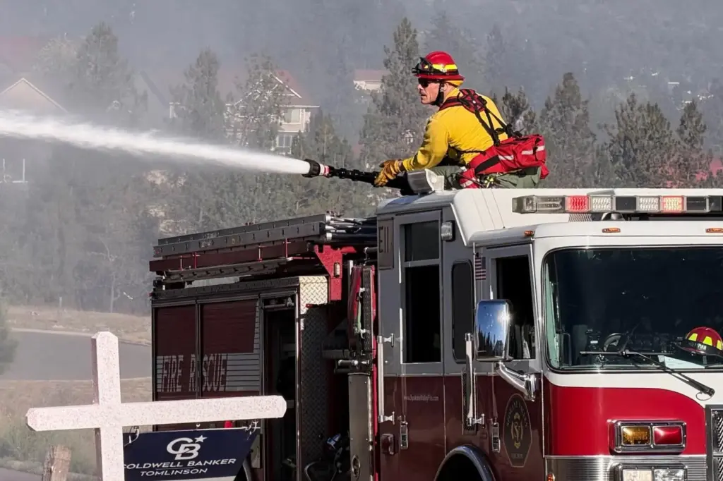 Fire crews battle the Upriver Fire on Tuesday, June 16,...