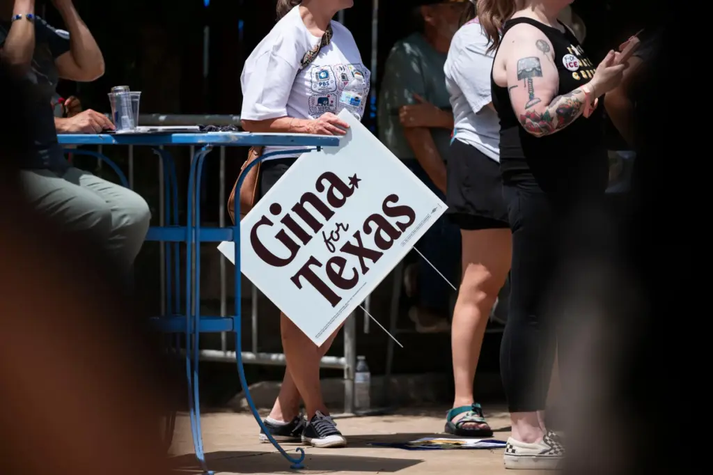 A supporter holds a sign for Democratic candidate for Texas...