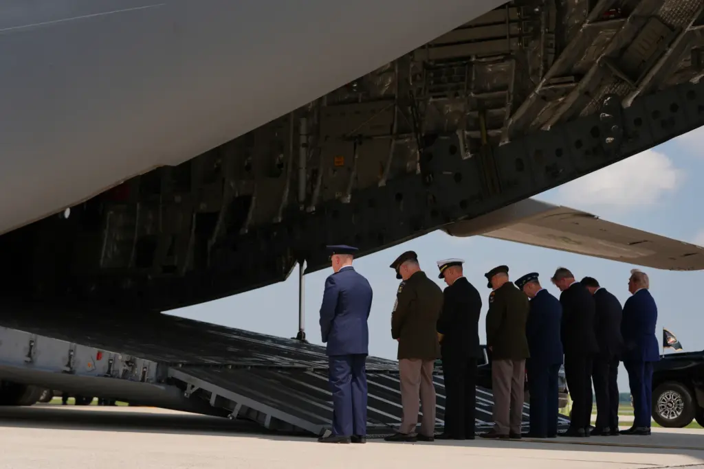 President Donald Trump, far right, and Defense Secretary Pete Hegseth,...