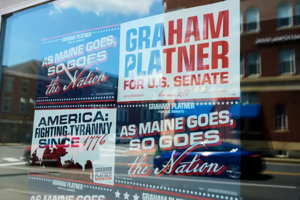 Campaign signs for former Democratic candidate for U.S. Senate Graham Platner.