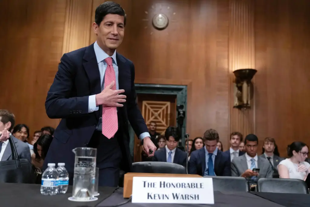 Federal Reserve Chairman Kevin Warsh arrives to testify before a Senate committee.