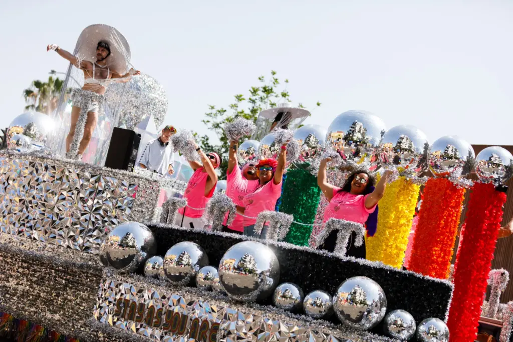 Participants with Hyatt wave to people. (Kristian Carreon / The...
