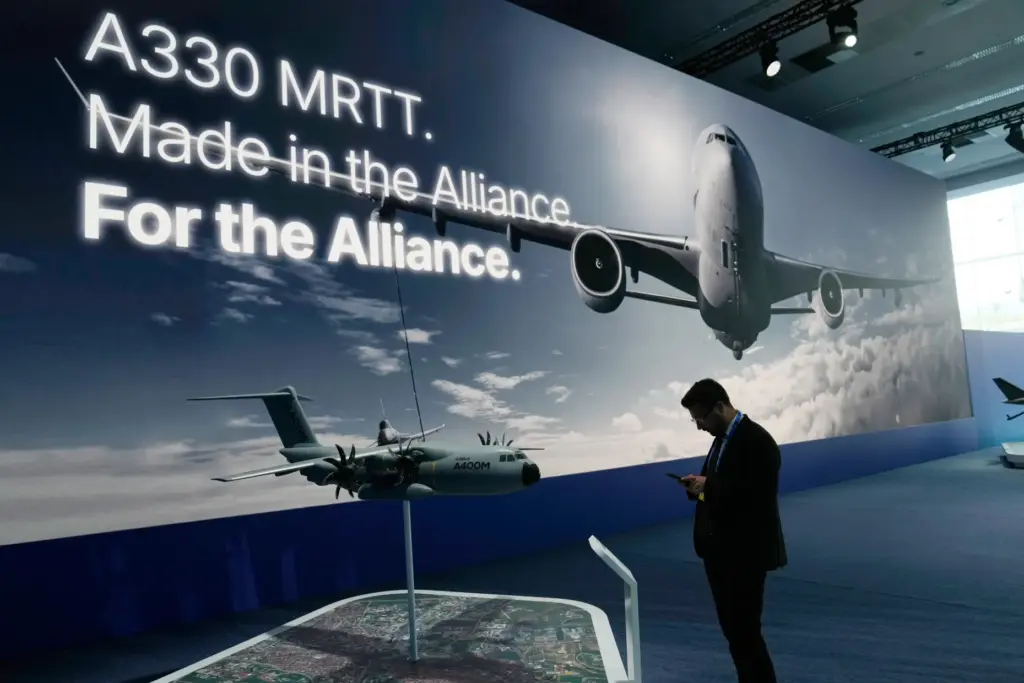 Participants view displays during the NATO Defense Industry Forum.