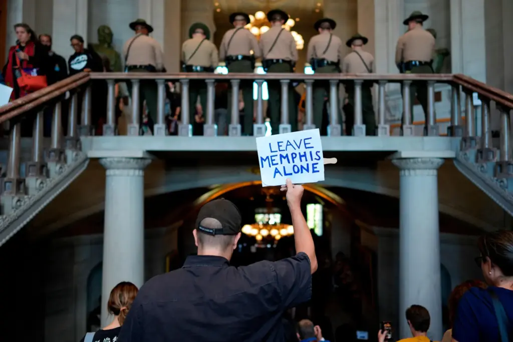 A person leaves the state Capitol after a special session of the state legislature.