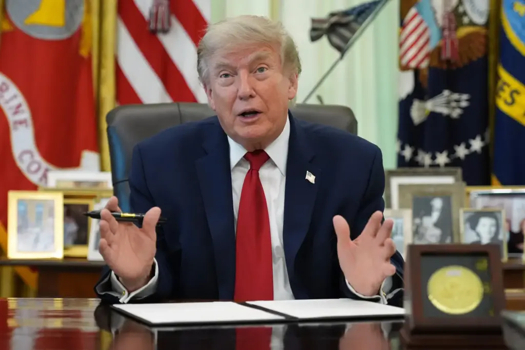 President Donald Trump speaks before signing a presidential memo to...