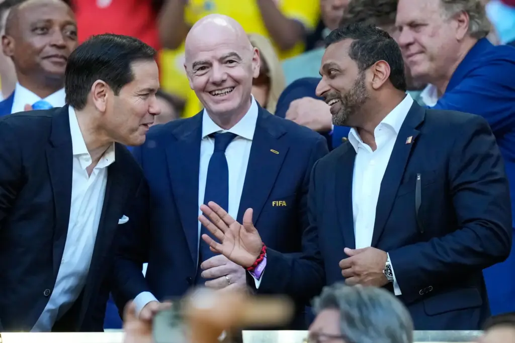 FIFA President Gianni Infantino, center, stands with United States Secretary...