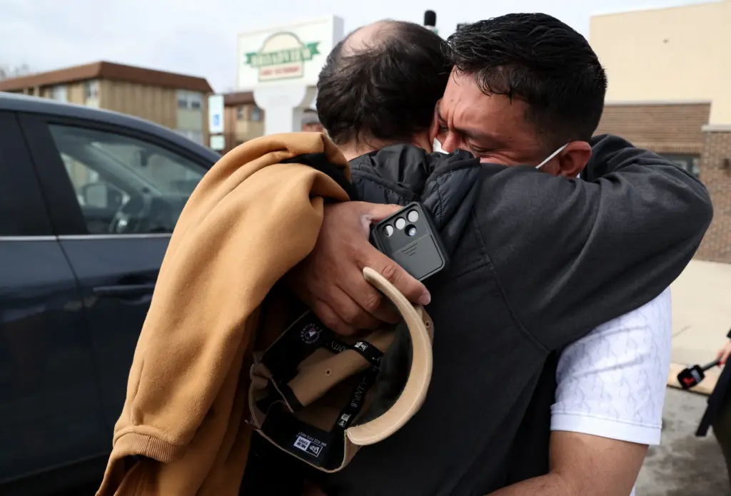 Venezuelan migrant brothers JosÃ© Gregorio GonzÃ¡lez, black shirt, and Alfredo...