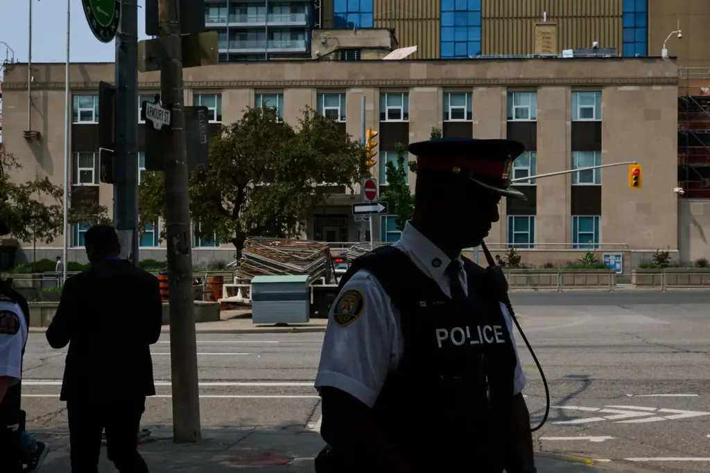 Police leave after speaking to media after a shot was...