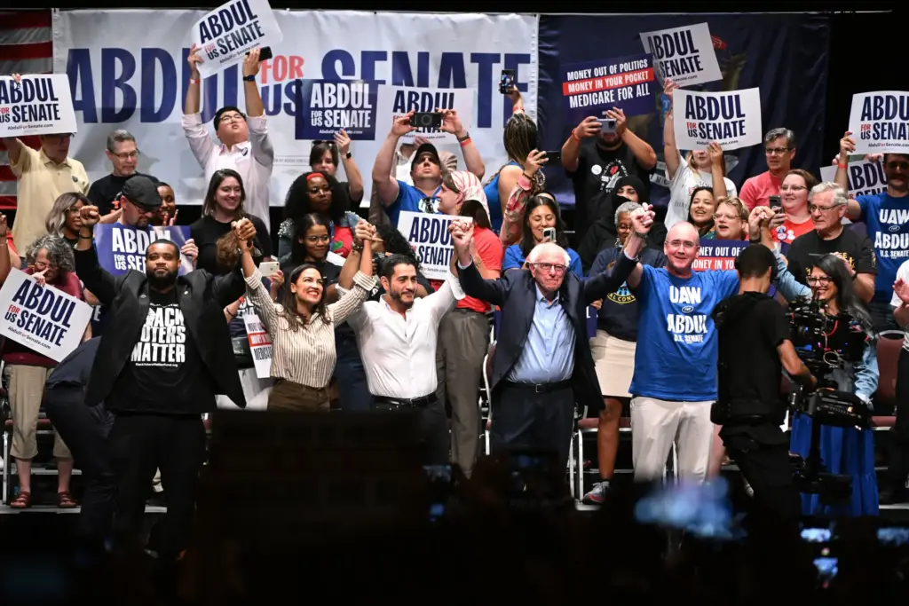 From left foreground, Michigan state Rep. Donavan McKinney, D-Detroit, U.S....