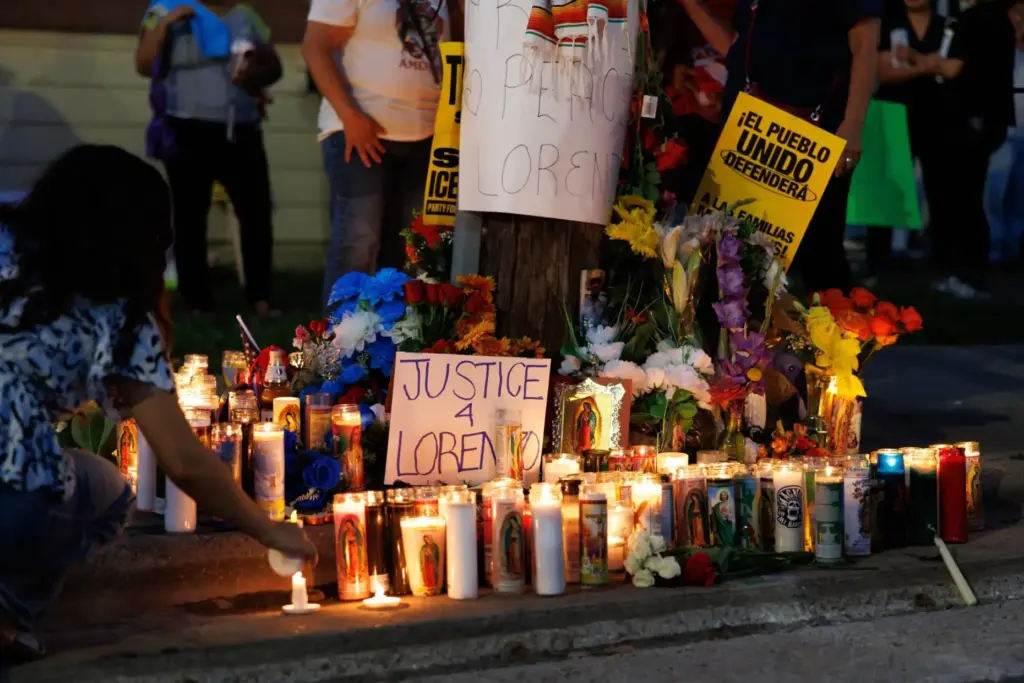 Candles are lit during a vigil for Lorenzo Salgado Araujo,...