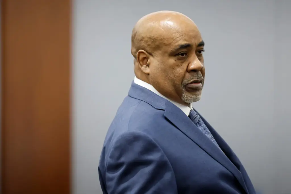 Duane Davis looks on during his trial, related to the...
