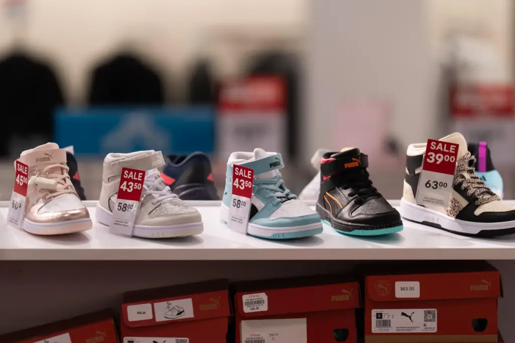 Children’s shoes for sale are displayed at a JCPenney store...