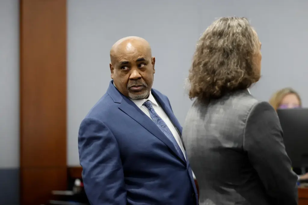 Duane Davis looks on during his trial, related to the...