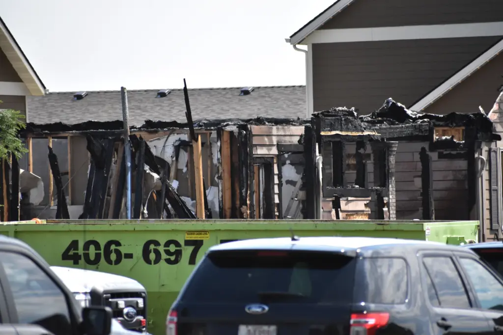A house where a family was killed is seen, Tuesday...