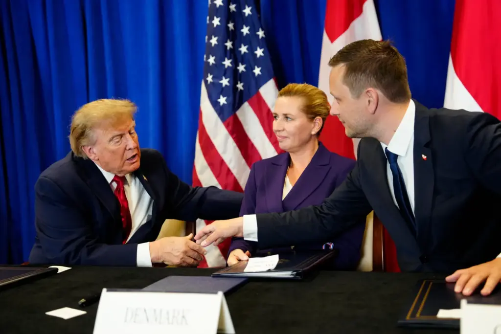 Denmark’s Prime Minister Mette Frederiksen, center, Greenland’s Prime Minister Jens-Frederik...