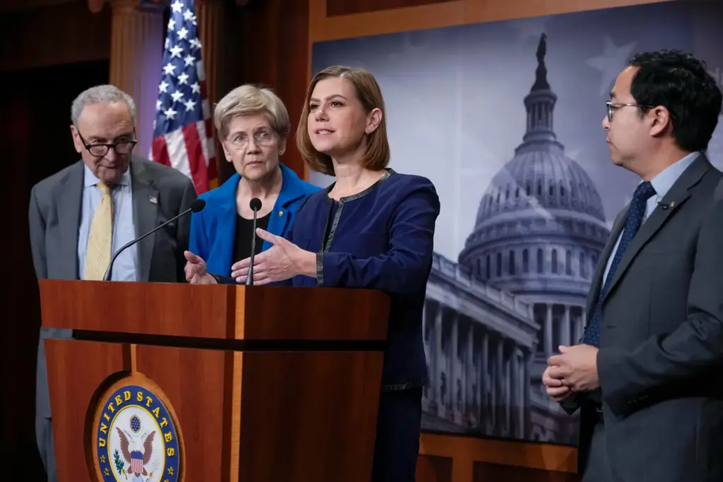 From left, Senate Minority Leader Chuck Schumer, D-N.Y., Sen. Elizabeth...
