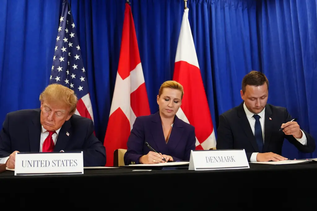 President Donald Trump signs a security agreement with Denmark’s Prime...