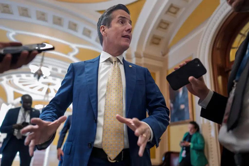 Sen. Bernie Moreno, R-Ohio, talks to reporters outside the chamber...