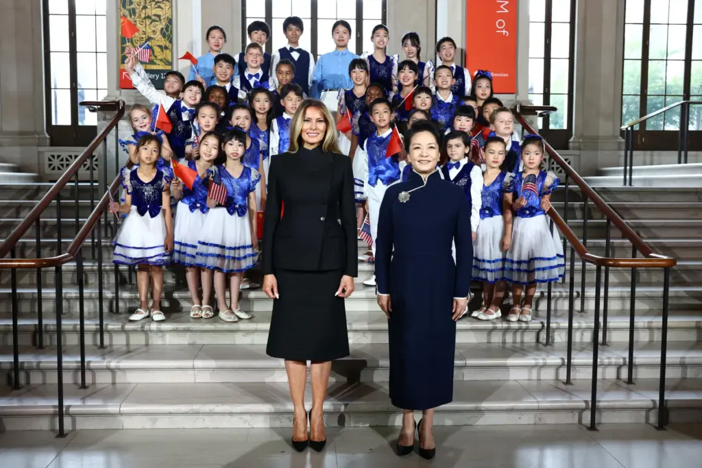 First lady of China Peng Liyuan, right, and first lady...