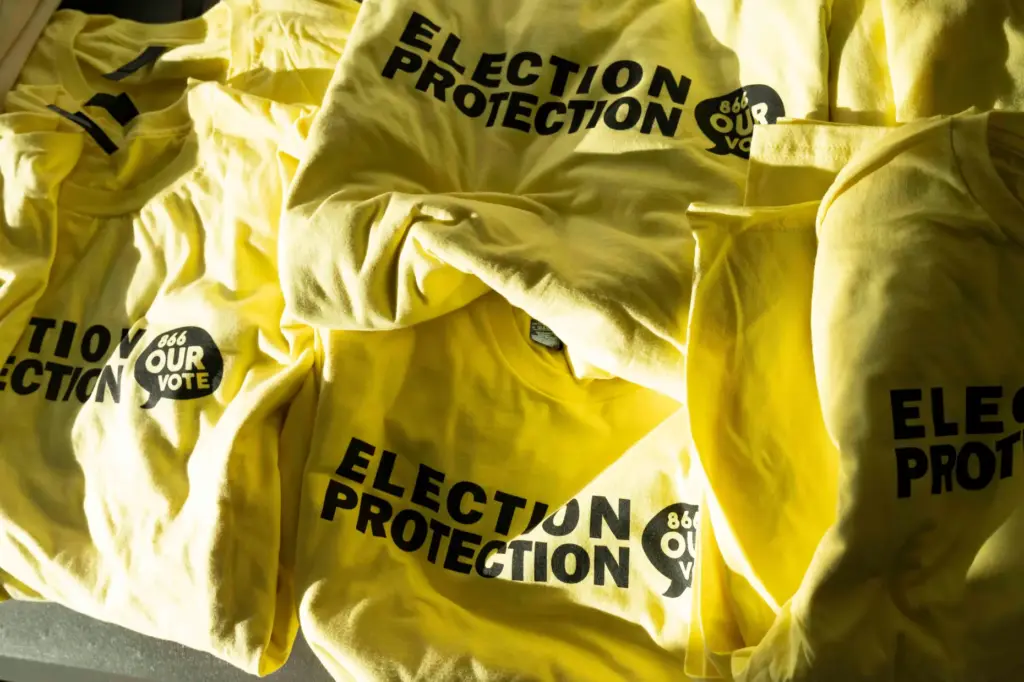 T-shirts are ready to be handed out to newly-trained poll chaplains and peacekeepers.