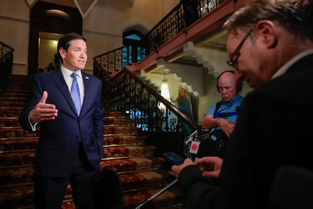 Marco Rubio speaks to the media upon his arrival at the Taj Mahal Palace Hotel.