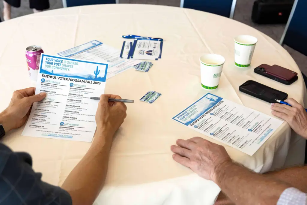 Rev. Dan Hoeger and Brad Weintraub review a list of upcoming events.