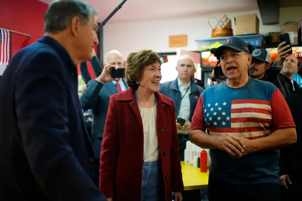 Sen. Susan Collins, with former West Virginia Sen. Joe Manchin,...