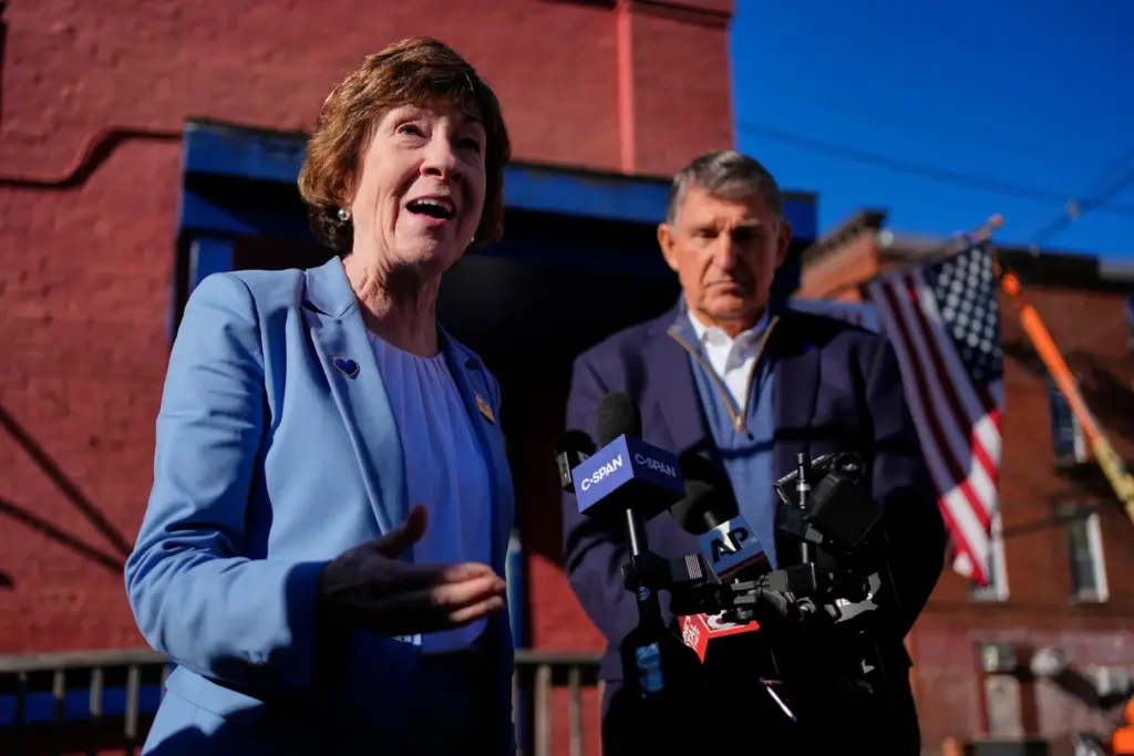 Sen. Susan Collins, with former West Virginia Sen. Joe Manchin,...