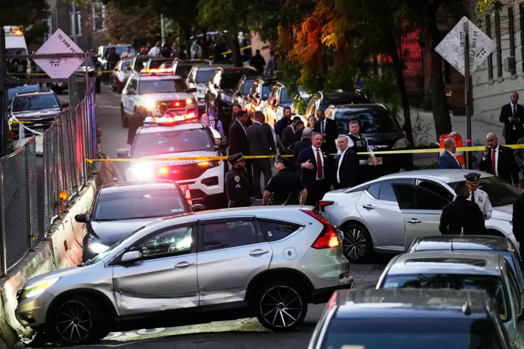 Law enforcement work the scene of a shooting Thursday, Oct....
