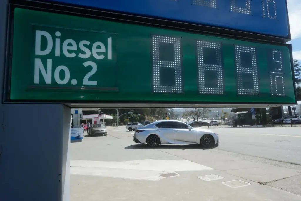 The cost of diesel is displayed on a gasoline price...